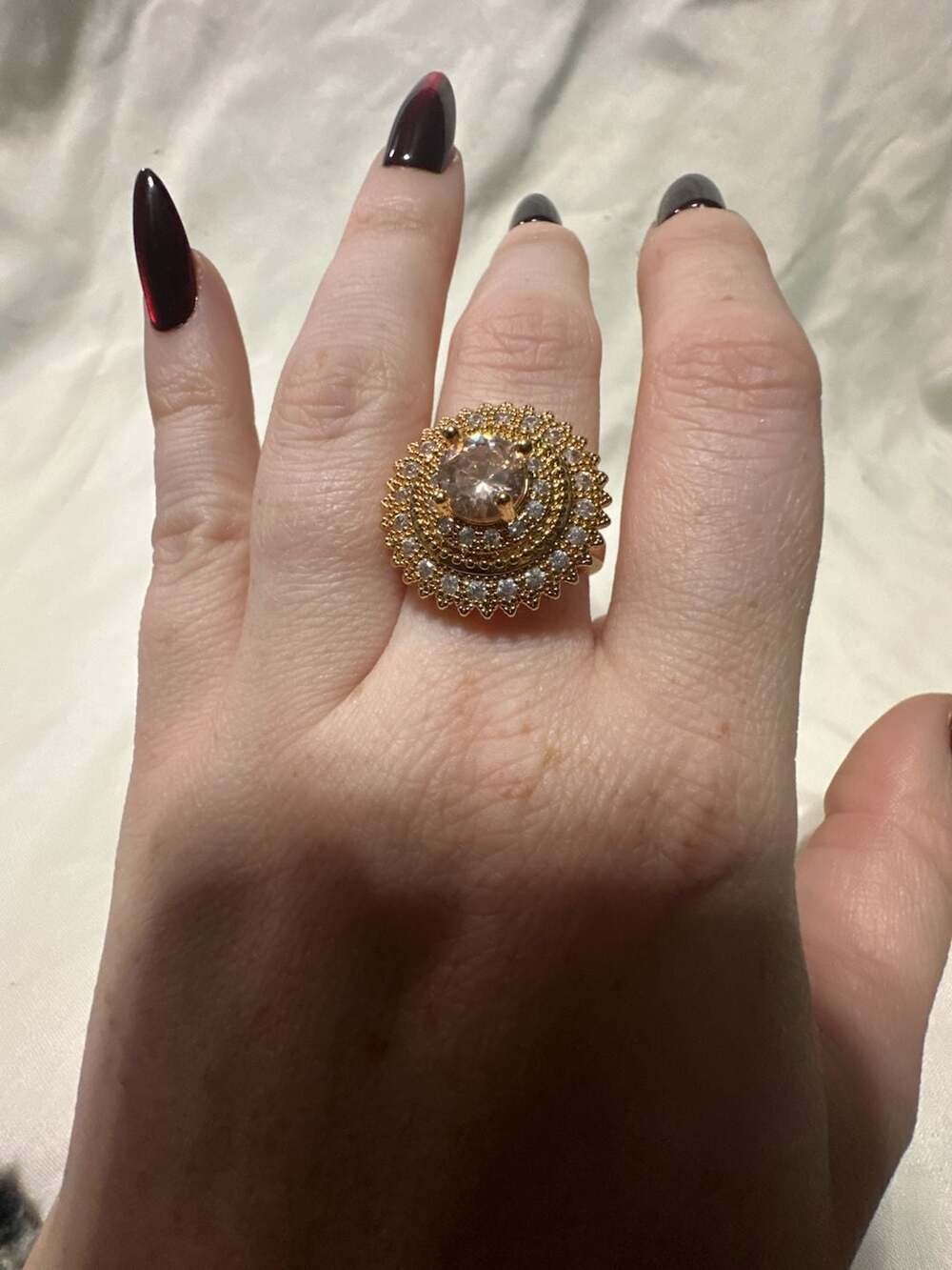 Gold Tone Cluster Cocktail Ring With Pink Center Stone